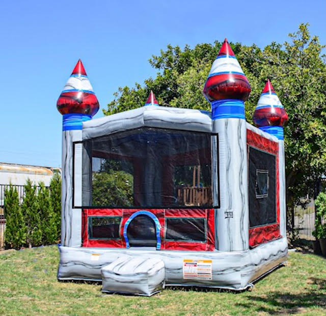 13 by 13 bounce house with a basketball hoop inside of it! 